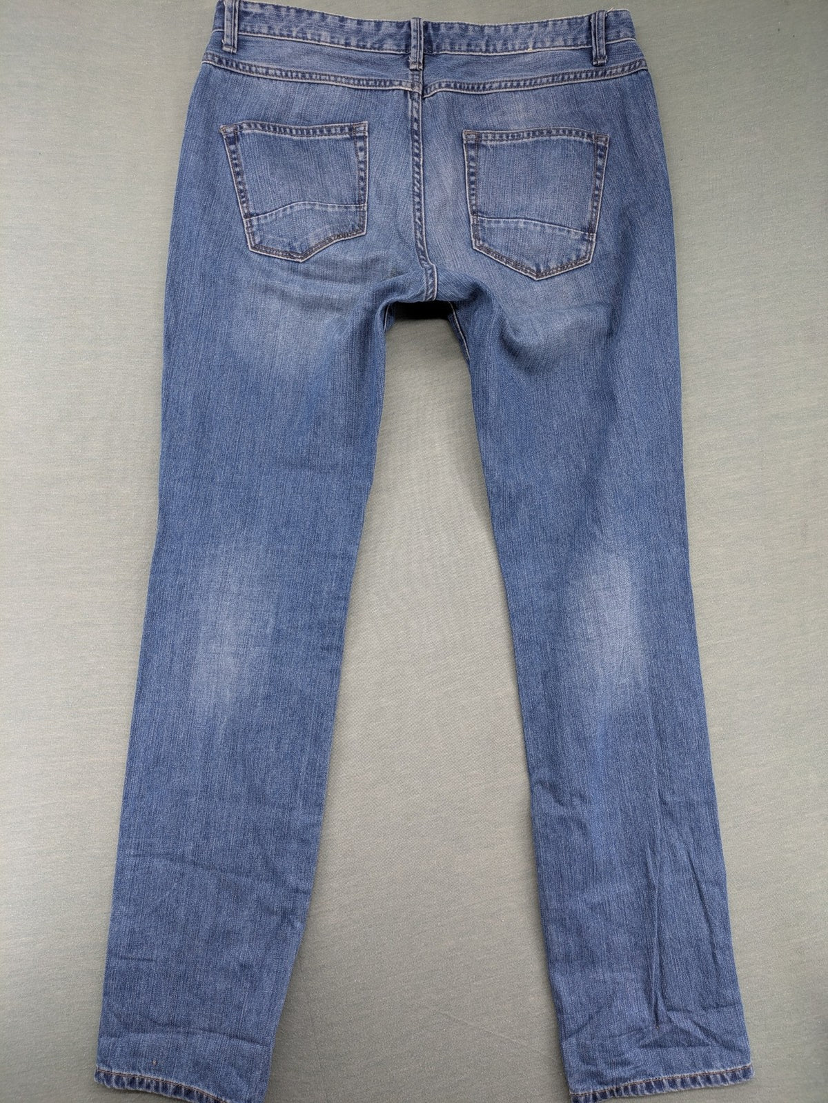Benetton Jeans blue straight leg denim with button fly and classic design.
