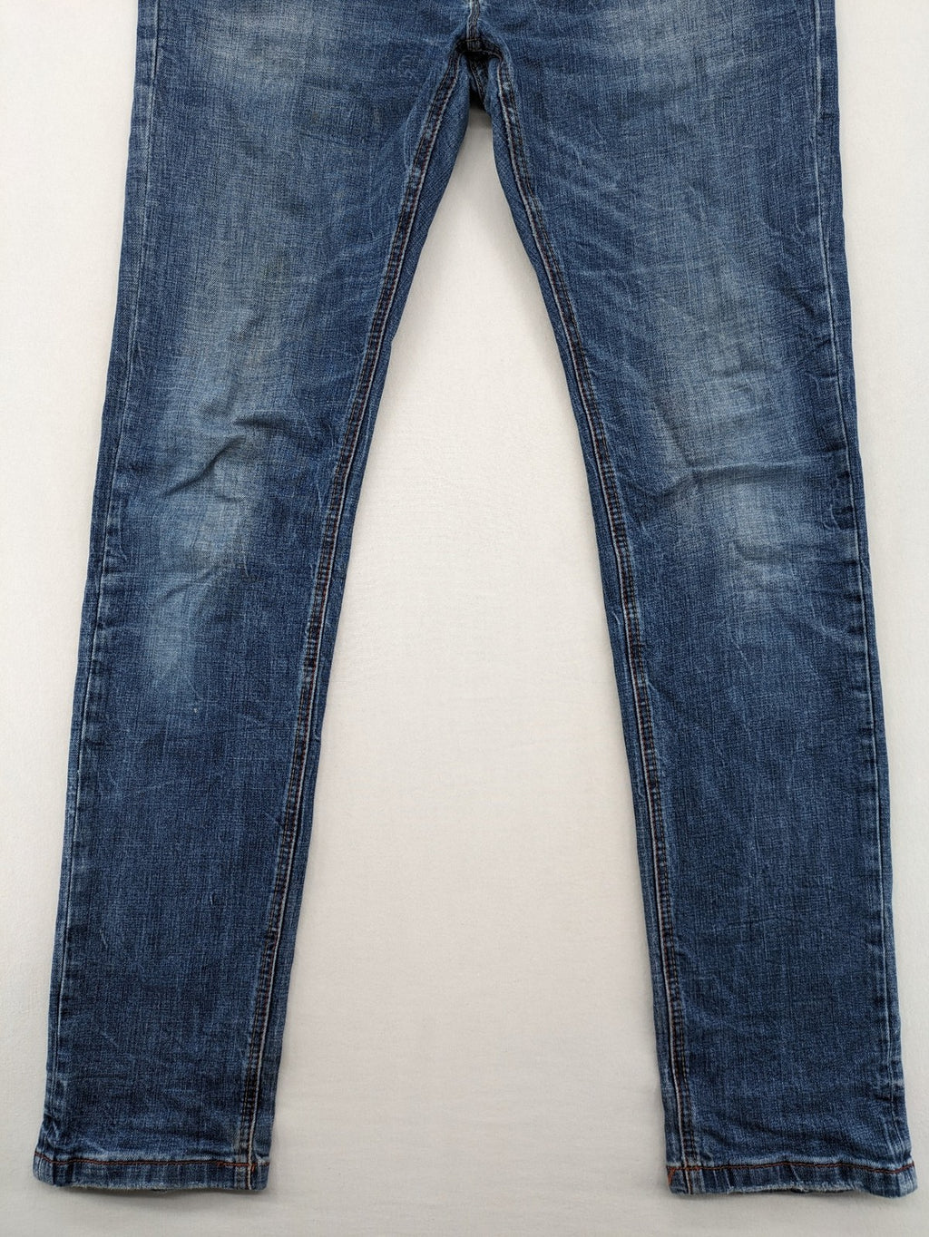 Timezone blue straight jeans slim fit with checkered pattern lining and button fly.