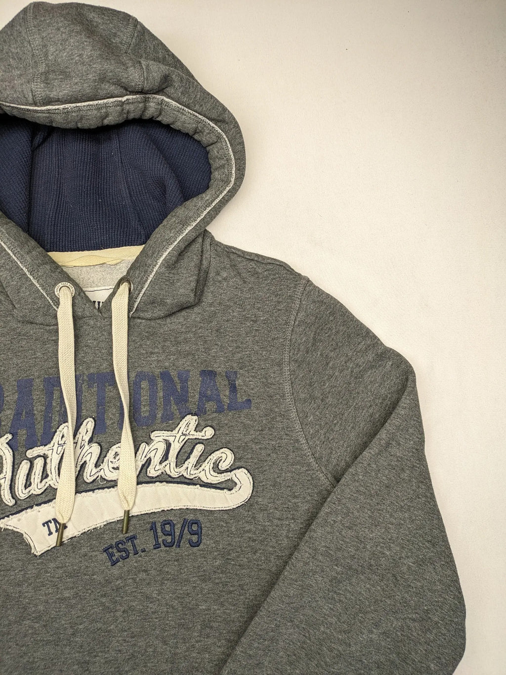 Livergy grey zip-through hoodie with "Traditional Authentic" graphic, kangaroo pocket, soft material.