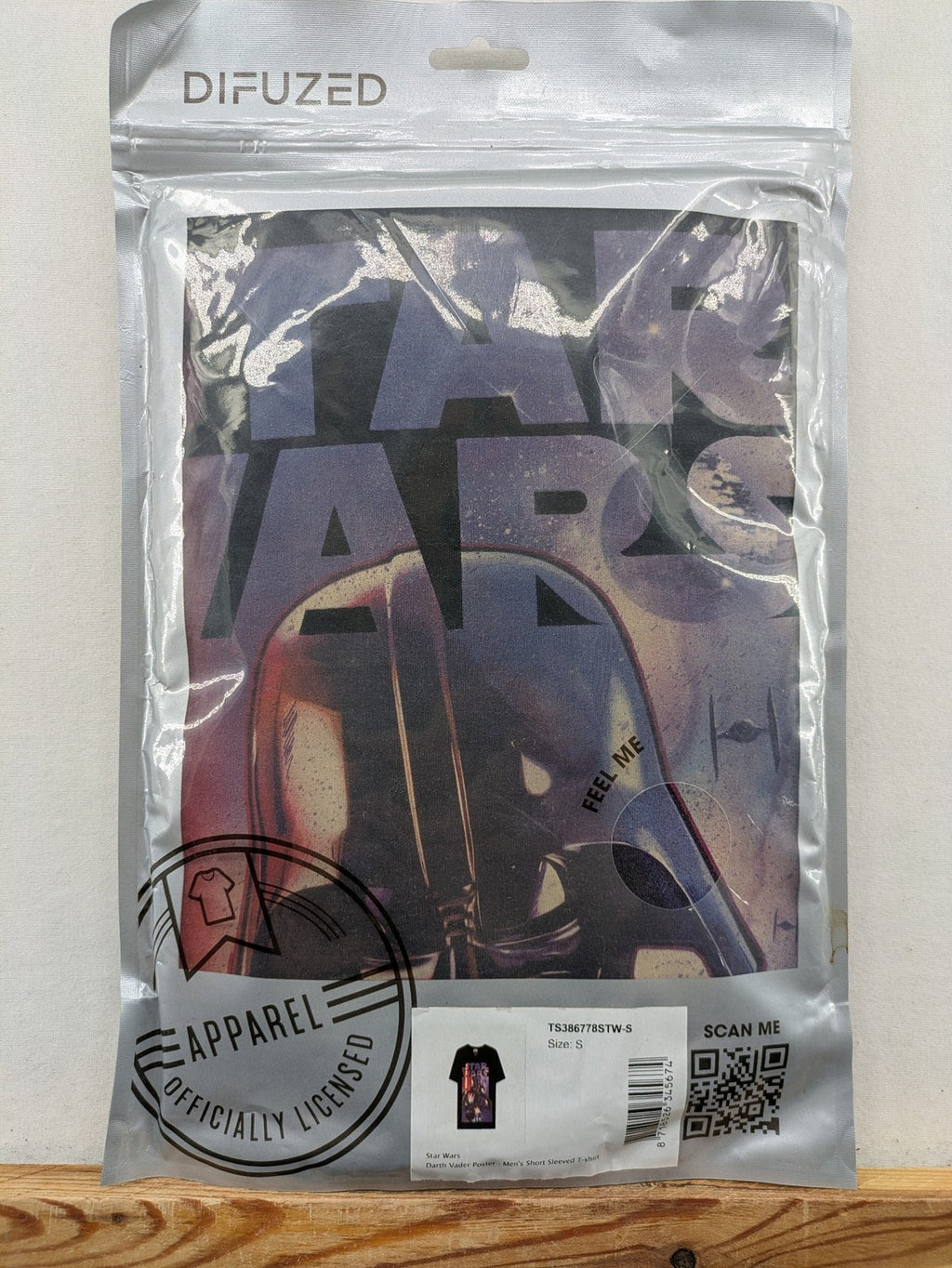 Star Wars black t-shirt featuring bold Darth Vader poster graphic, short sleeves.