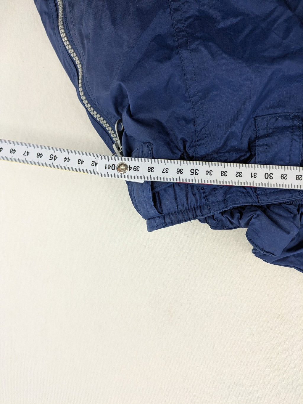 Shamp navy and yellow vintage ski jacket and pants set with retro design.
