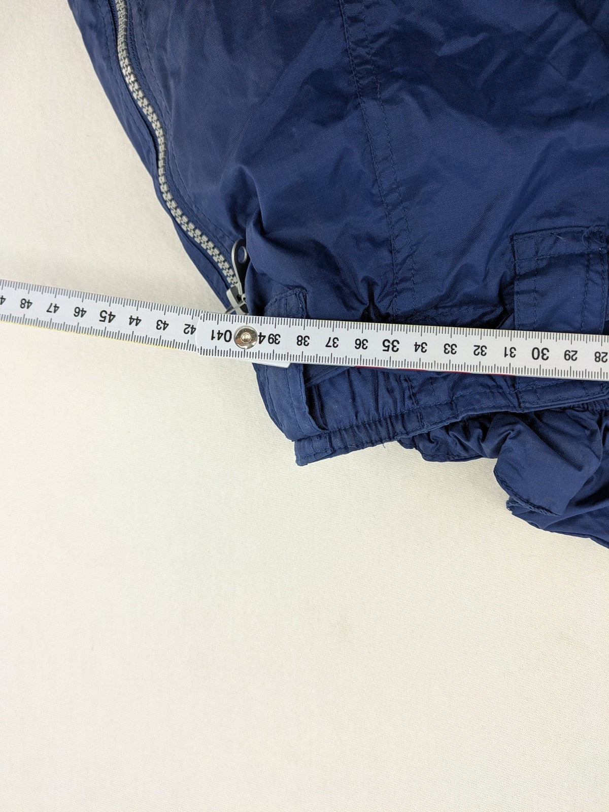 Shamp navy and yellow vintage ski jacket and pants set with retro design.
