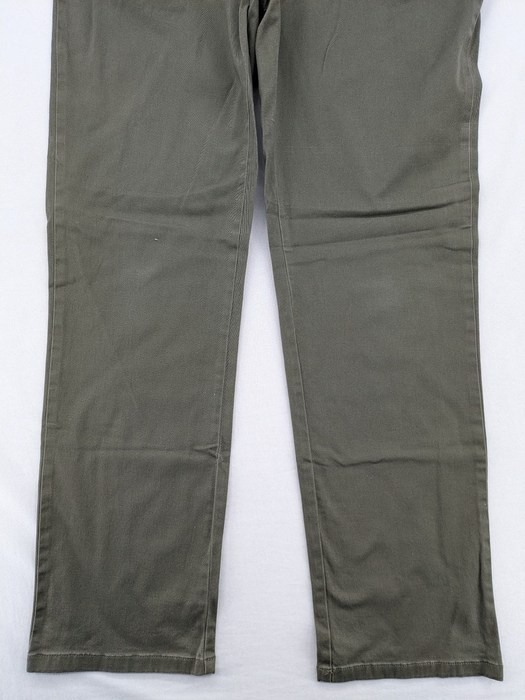 Man's World khaki chino pants with button and zipper closure, made from cotton-elastane blend.
