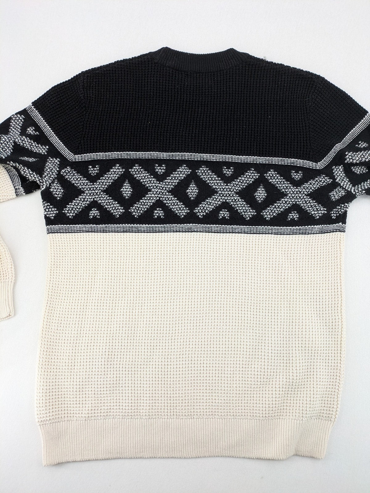C&A turtle neck jumper black cream with Nordic pattern and waffle knit texture.