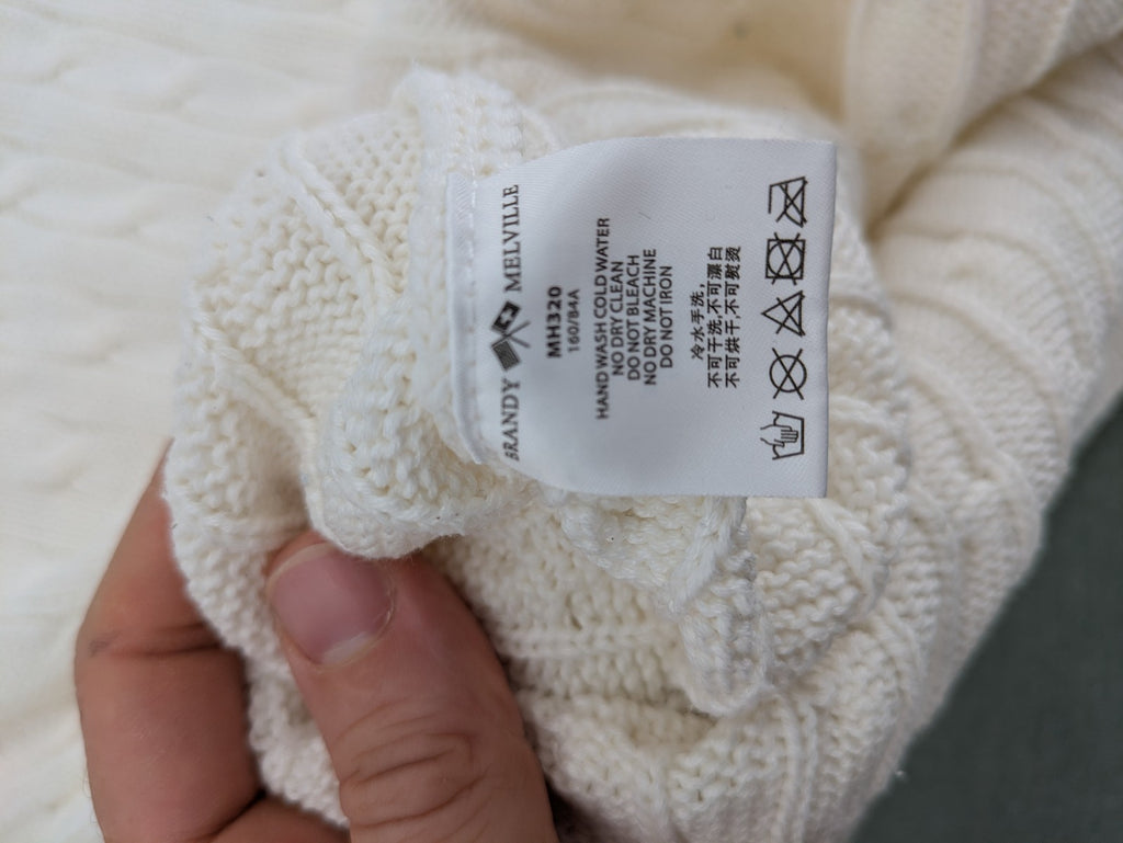 Brandy Melville cream turtle neck jumper with allover cable knit pattern and ribbed hem.