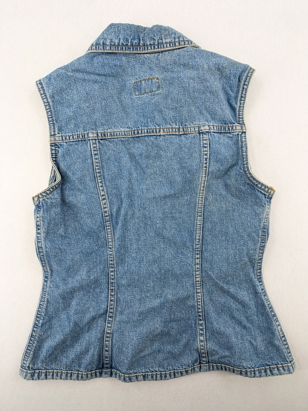 s.Oliver blue denim vest with button closure, pointed collar, and breast pockets.