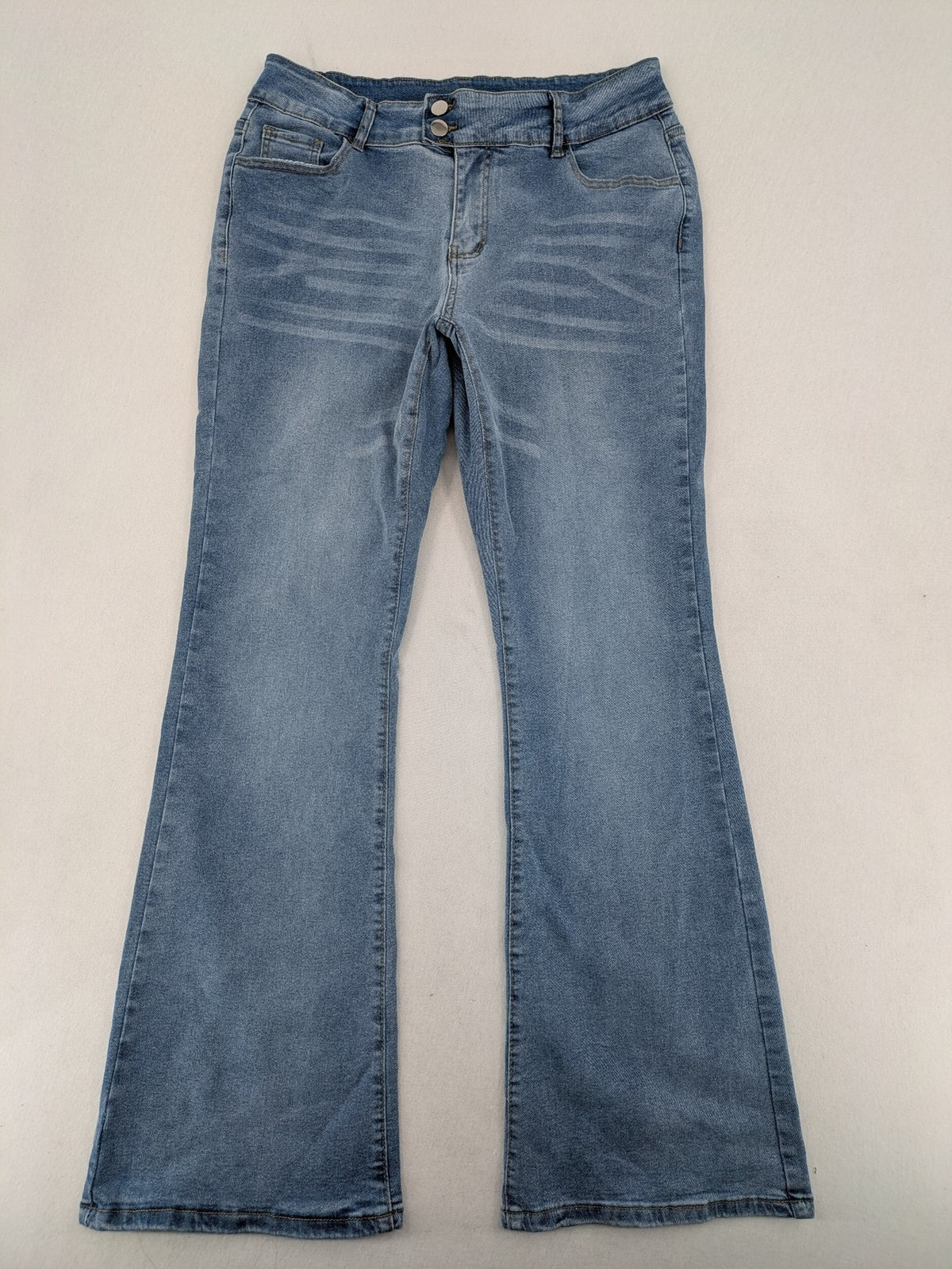 C&A blue bootcut jeans high waist stretch denim with double button closure.