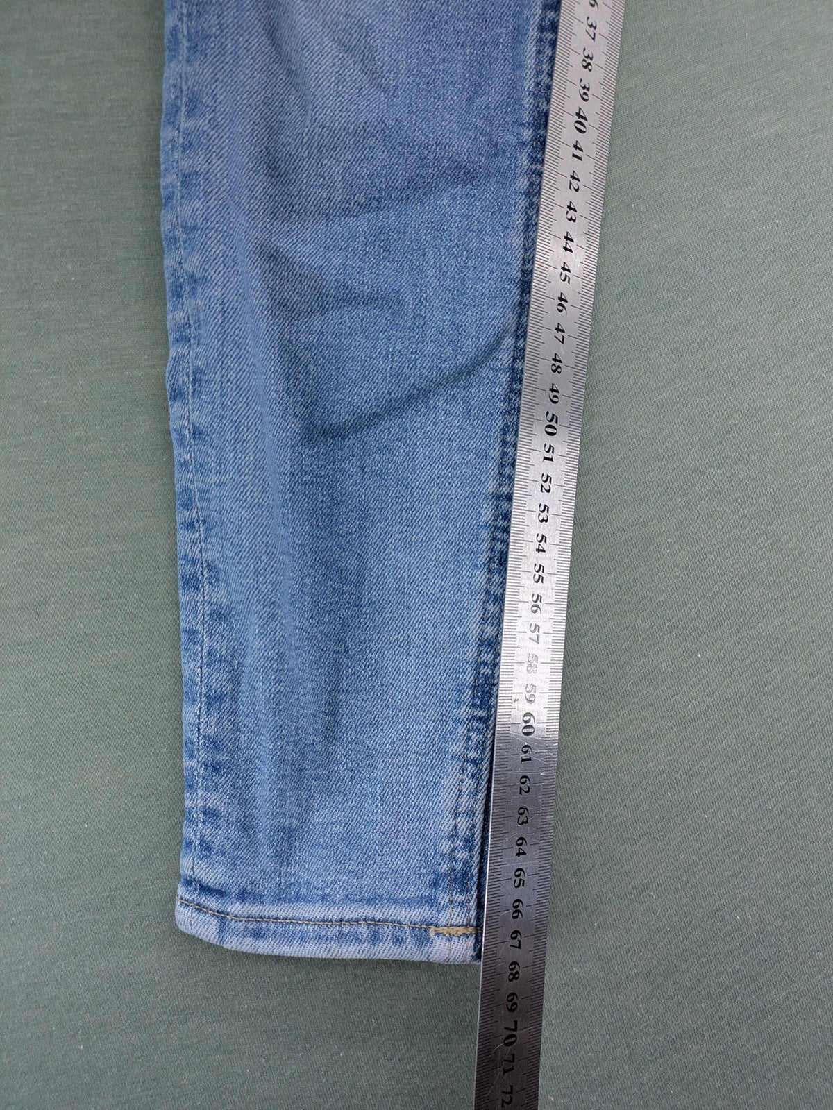 Calvin Klein Jeans blue high rise super skinny ankle jeans with logo patch and stretch material.