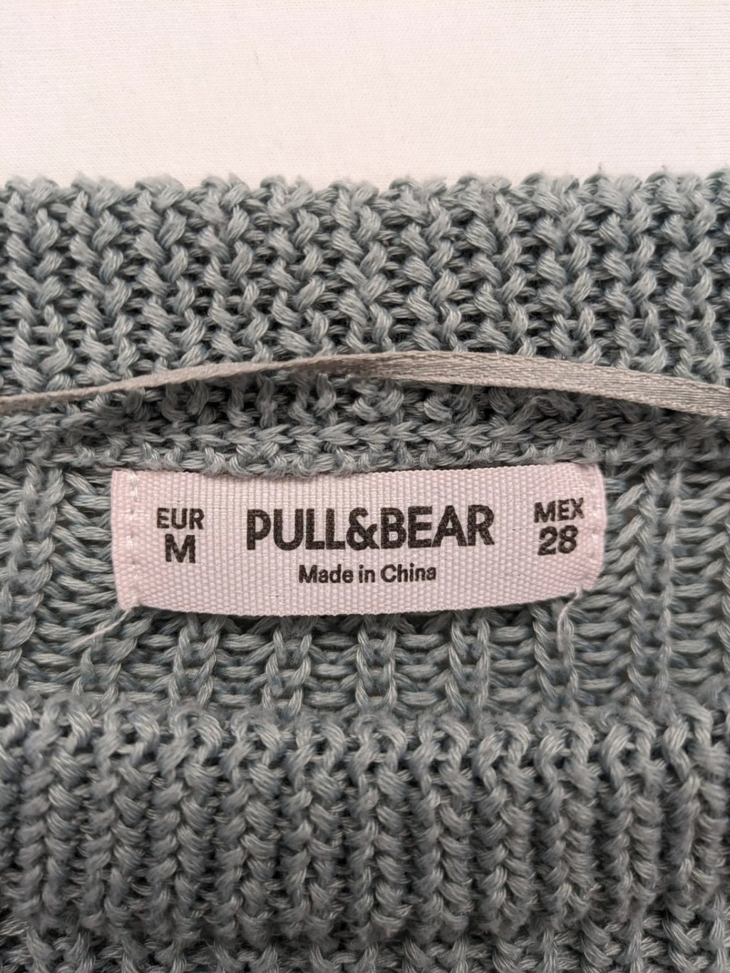 Pull&Bear beige turtle neck jumper with block stripe pattern and ribbed knit texture.