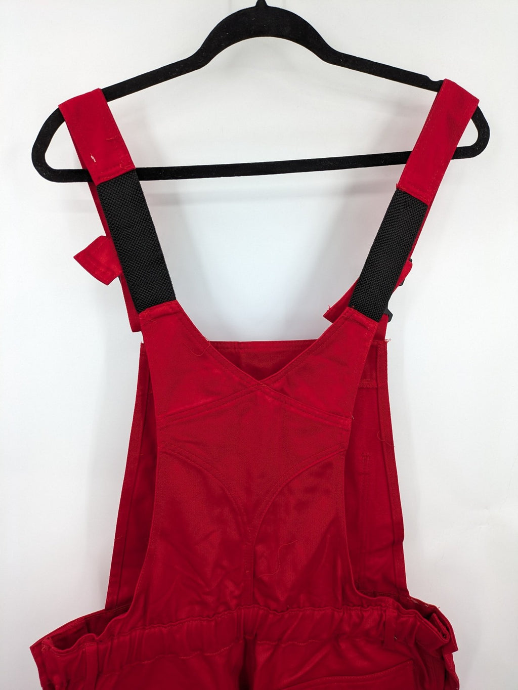 Stonekit red work overalls cotton with adjustable straps and multiple cargo pockets.