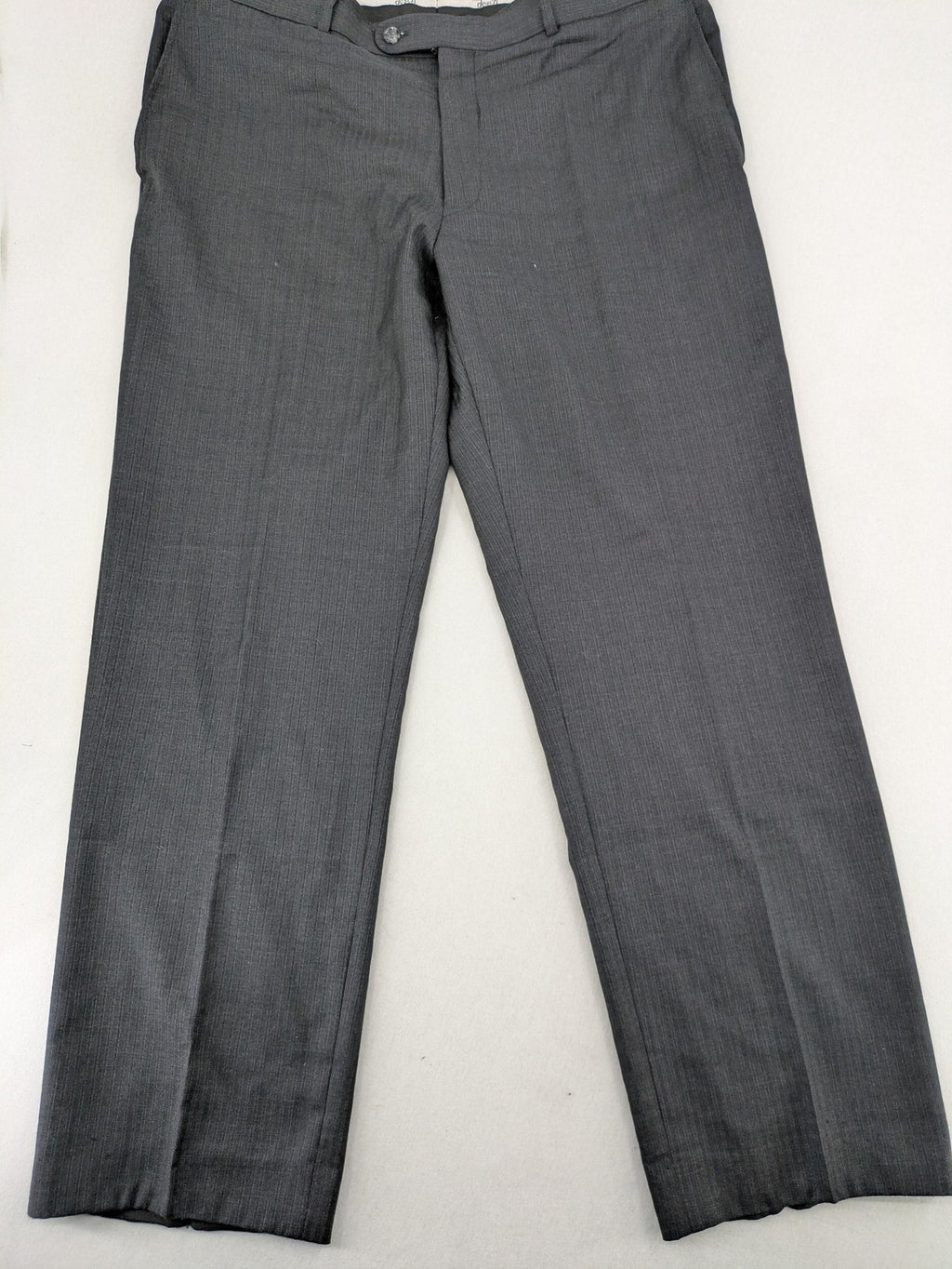 Desch grey suit pants with subtle pinstripe pattern and flat front design.