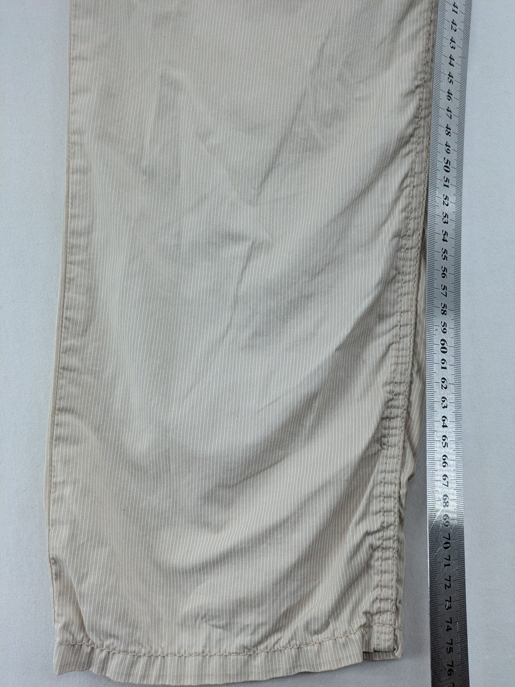 BRAX beige striped pants with logo, made from comfortable stretch cotton blend.