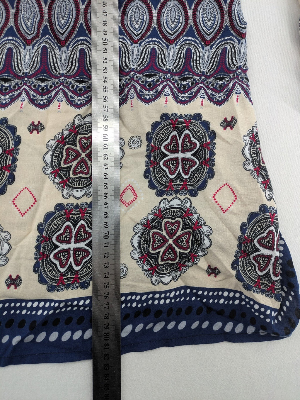 Uğurlar Collection multi tunic dress with vibrant Boho-Ethno pattern and V-neck tassel detail.