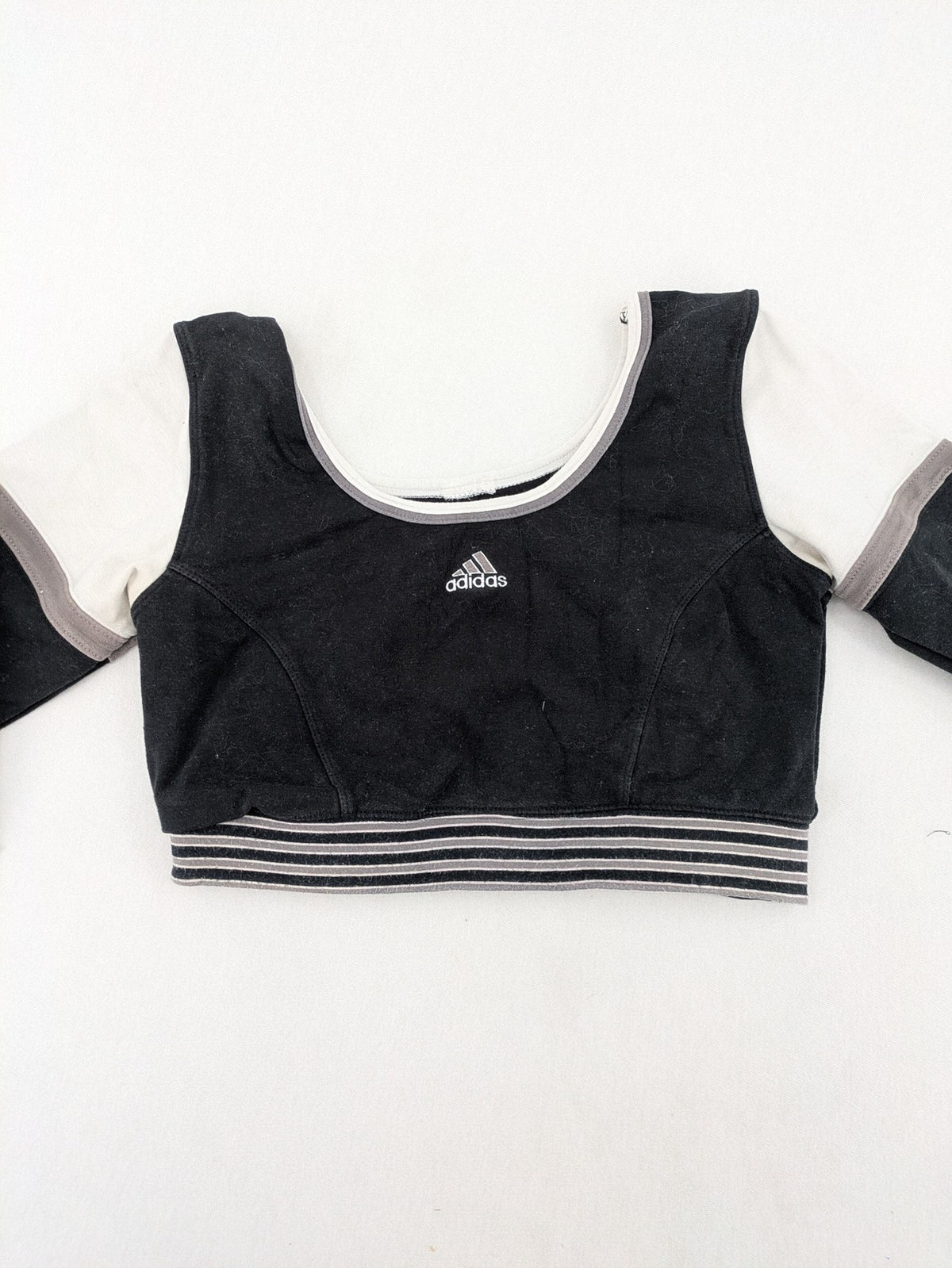 Adidas long sleeve crop top black grey white color-blocking with embroidered logo.