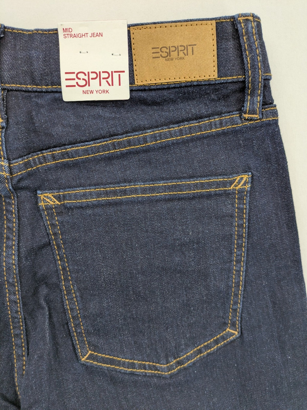 Esprit blue straight leg jeans mid rise with classic 5-pocket design and contrast stitching.