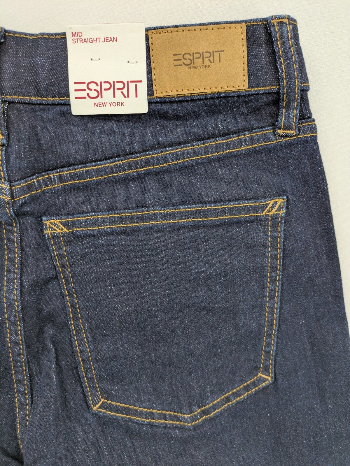 Esprit blue straight leg jeans mid rise with classic 5-pocket design and contrast stitching.