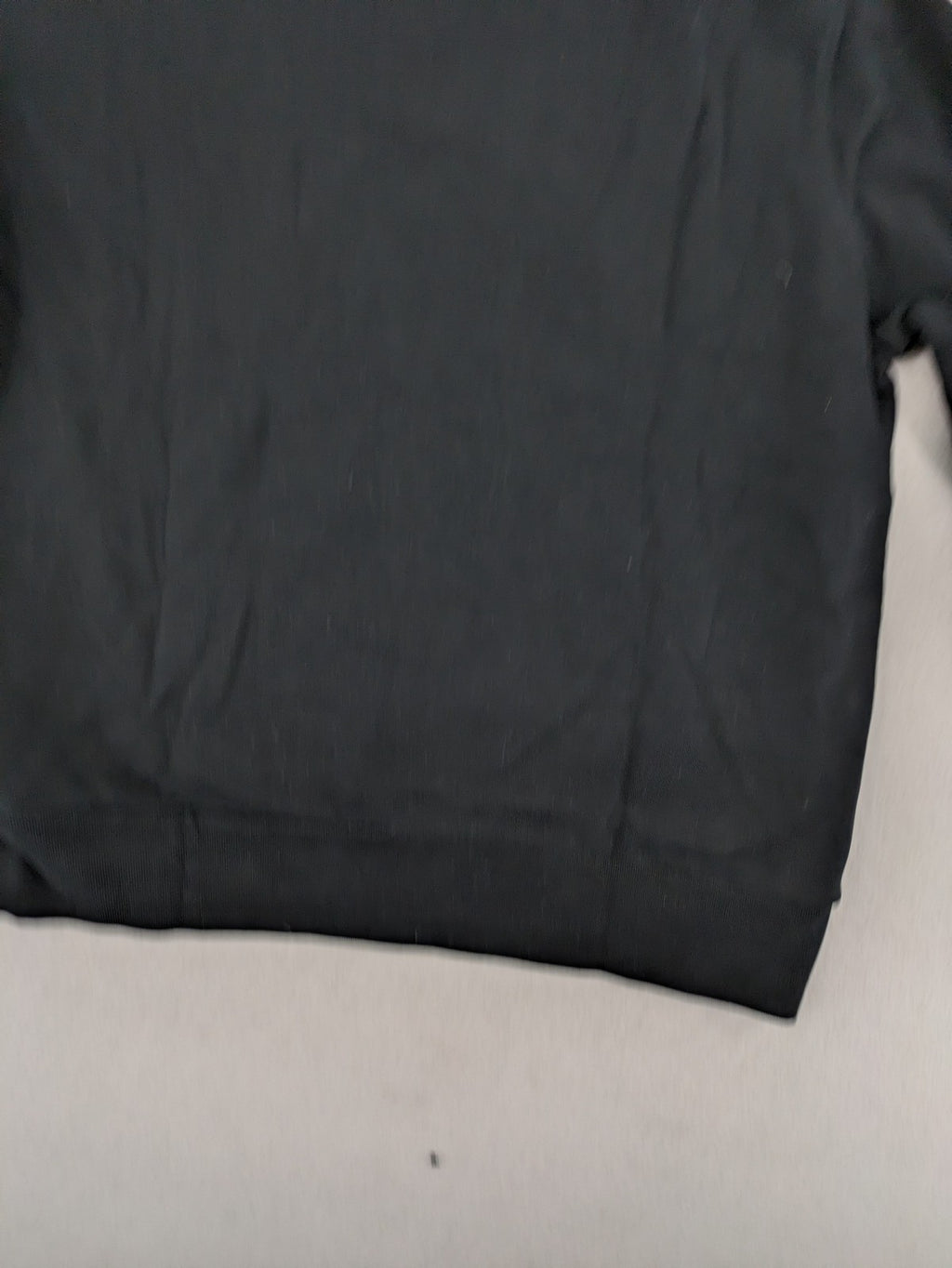 Armedangels black turtle neck jumper with embroidered logo, made from 100% organic cotton.