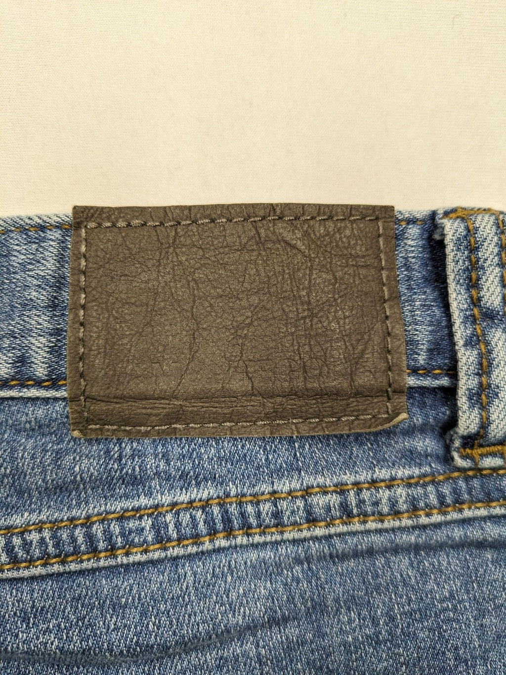Montego blue straight jeans with stretch denim, classic design, and regular fit.