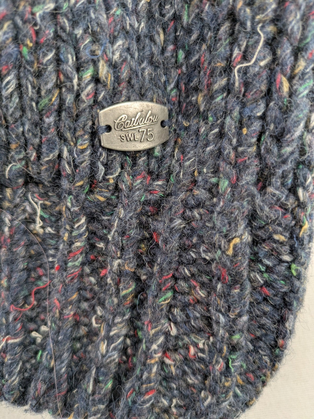 Catbalou multi turtle neck jumper with classic shawl collar and button closure.