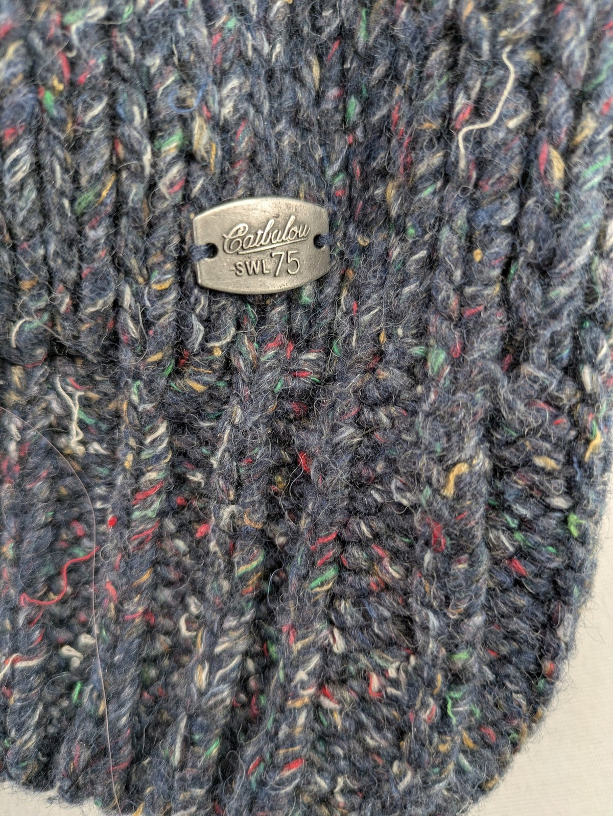 Catbalou multi turtle neck jumper with classic shawl collar and button closure.
