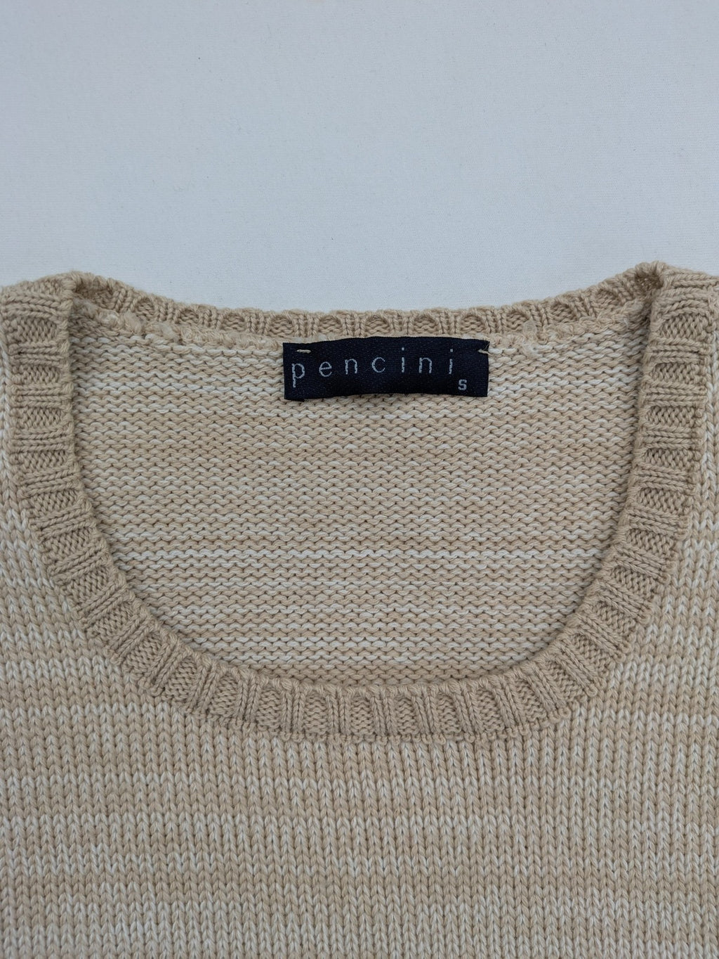 Pencini beige turtle neck jumper, sleeveless design, soft merino wool blend.
