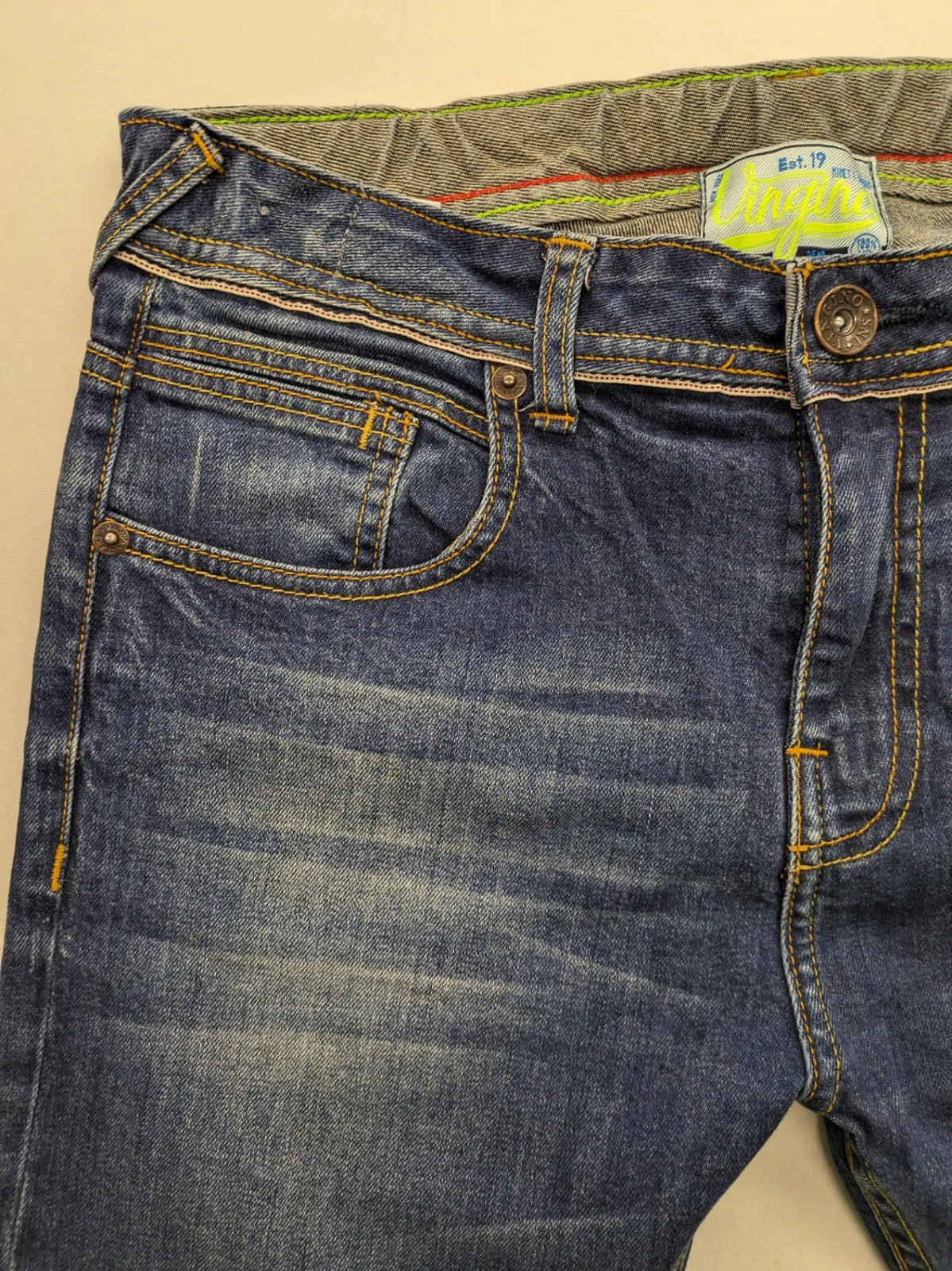 Vingino blue straight jeans medium wash 5-pocket design with zipper fly and stretch denim.