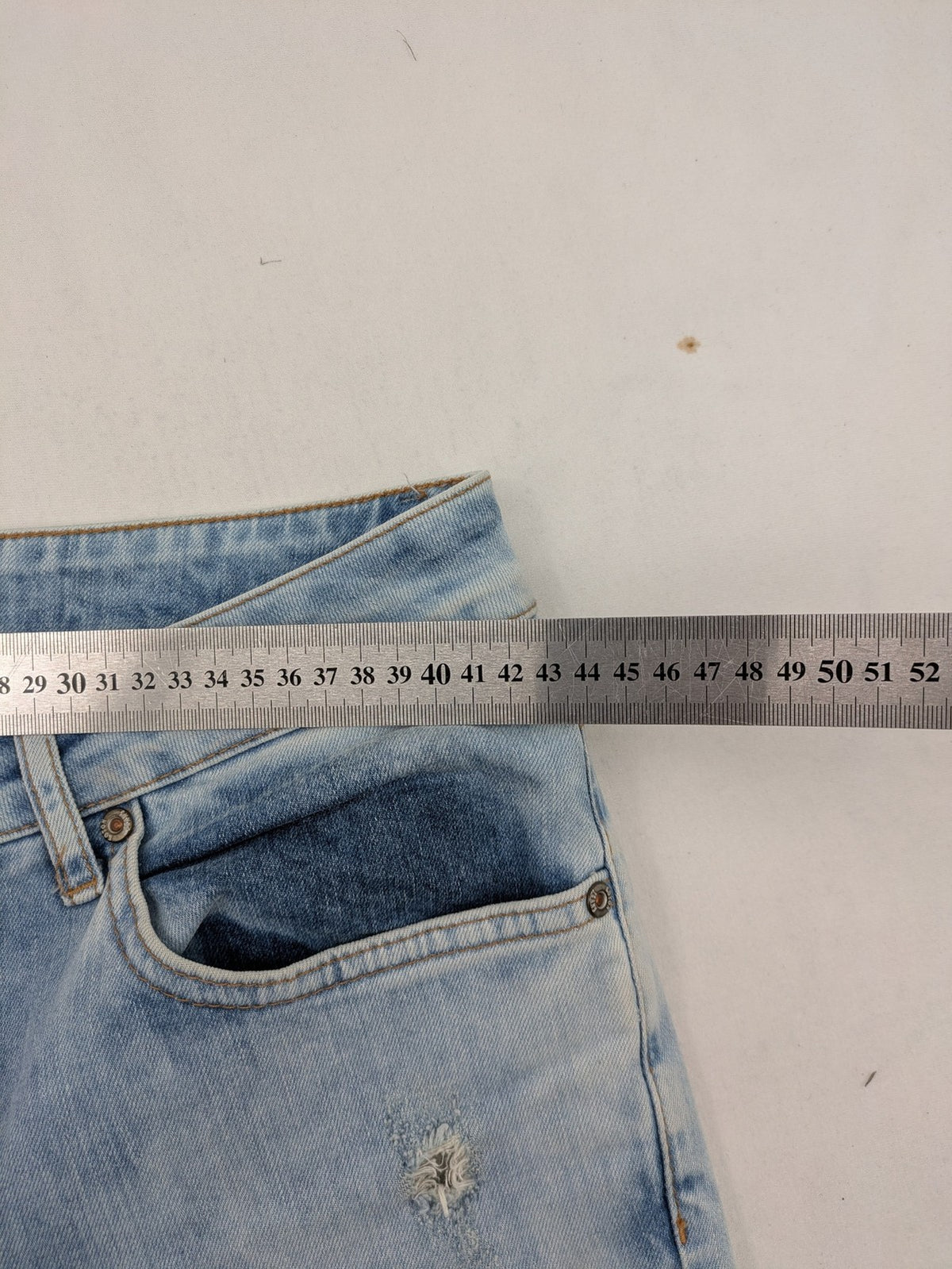 Koton Jeans blue straight jeans with distressed details and classic 5-pocket style.