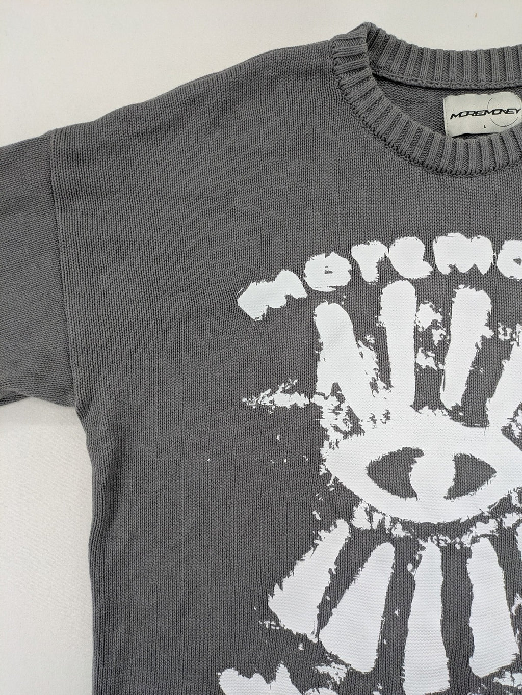 MOREMONEY grey turtle neck jumper with white abstract graphic print and relaxed fit.