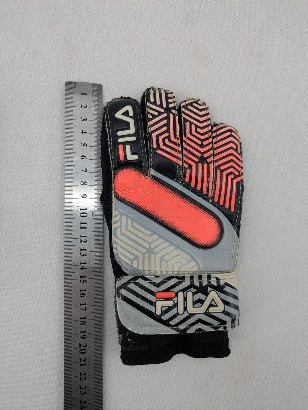 Fila soccer gloves black grey red geometric pattern padded backhand