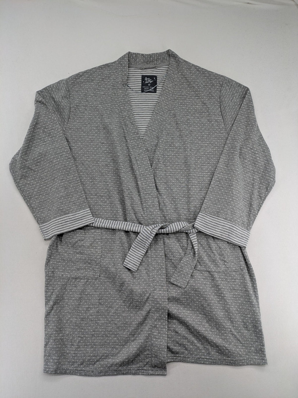 Drizzle turtle neck jumper black grey with abstract graphic print and distressed details.