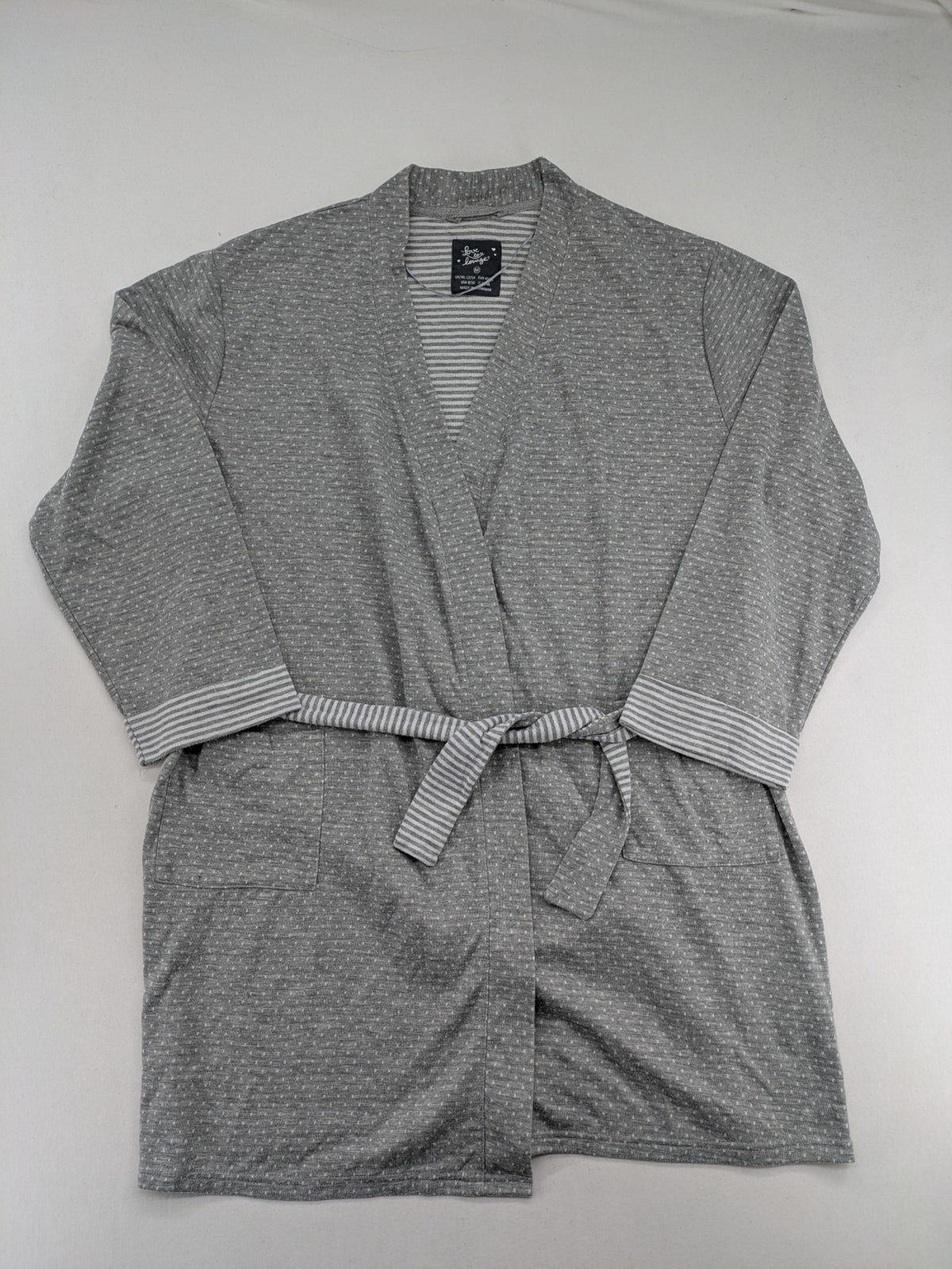 Drizzle turtle neck jumper black grey with abstract graphic print and distressed details.