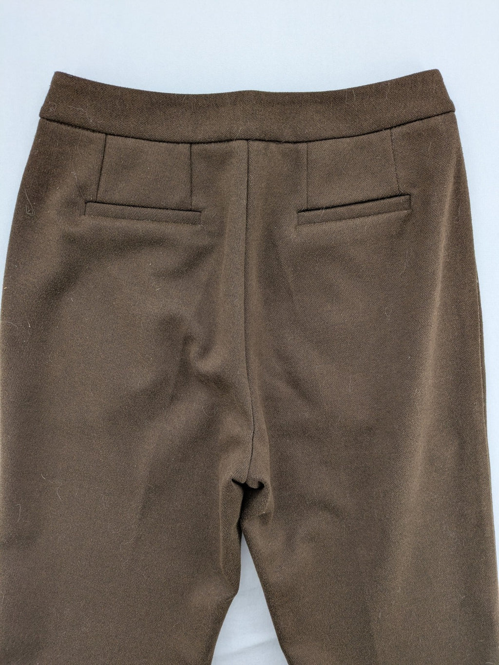 Liuliu pink high waist pants with pleats, side pockets, and classic design.
