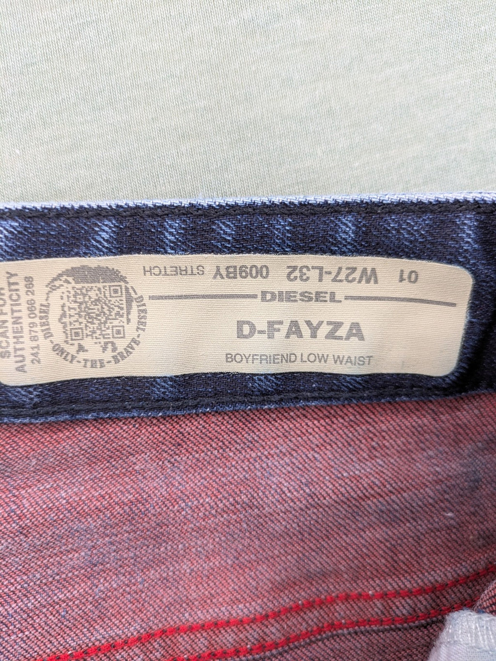 Diesel blue boyfriend jeans low waist dark wash stretch denim with logo patch.