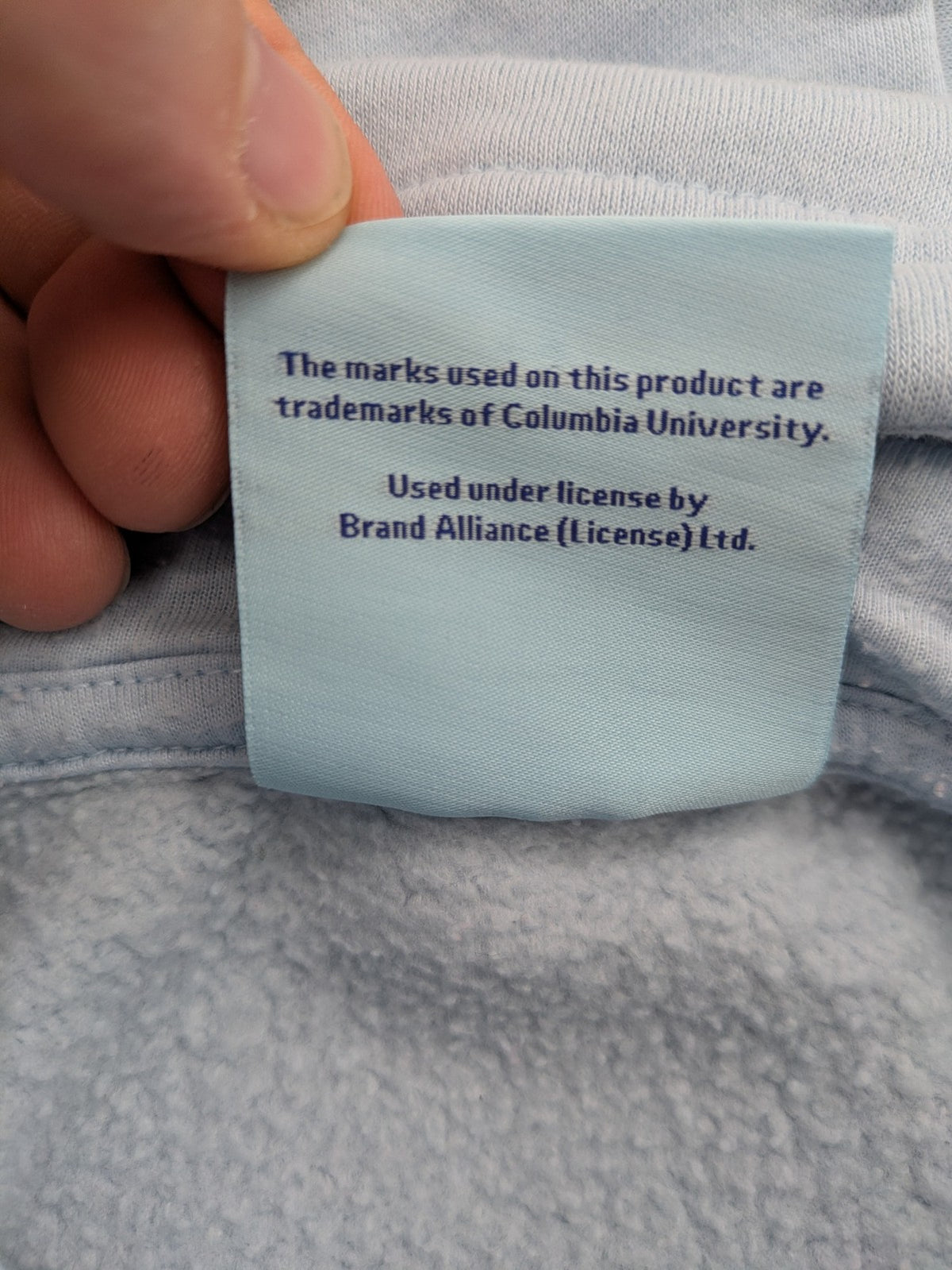Columbia University blue hoodie with large "Columbia University" text on chest.