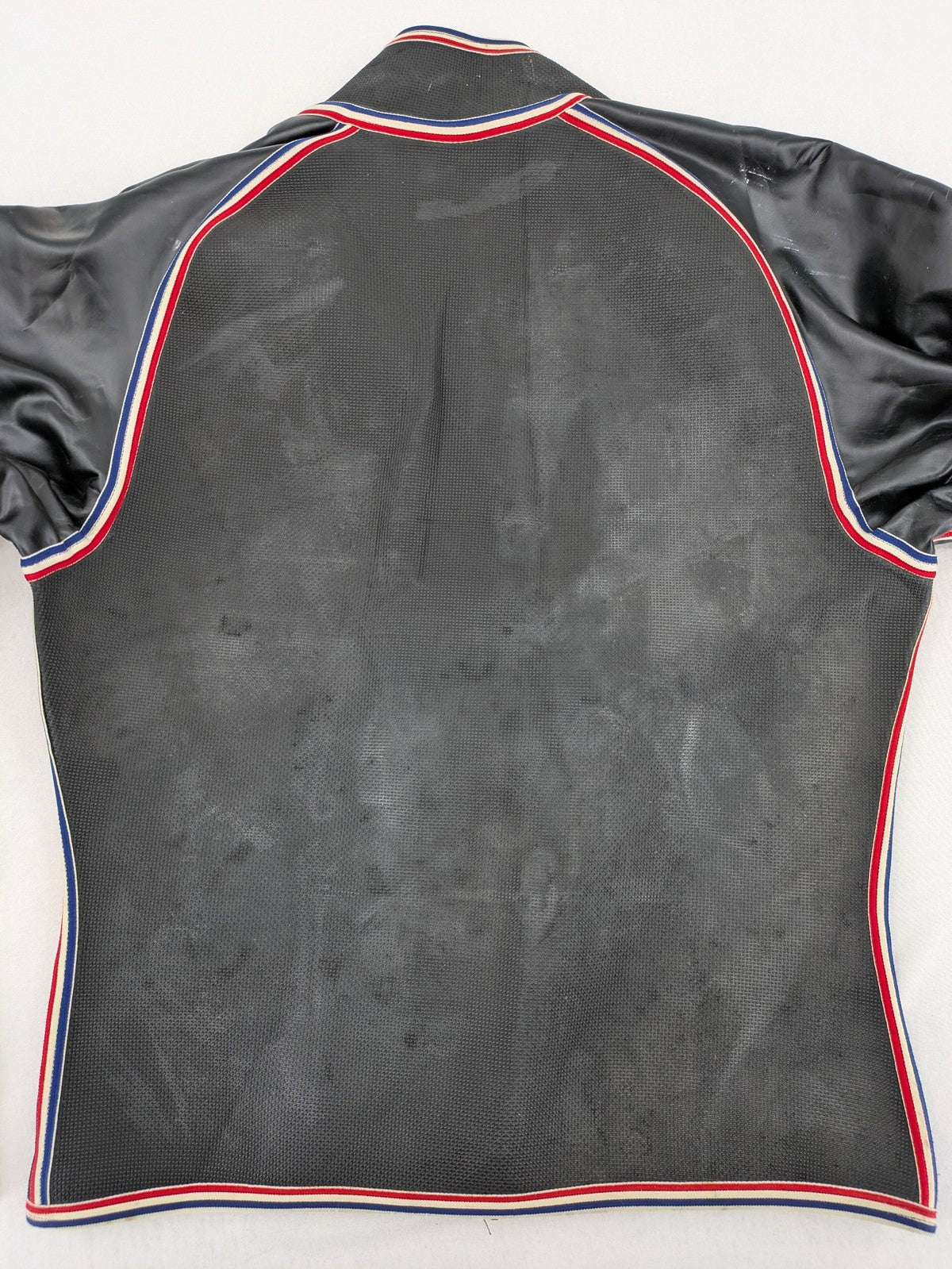 Camaro vintage jacket multi-colour with striped accents and structured body.