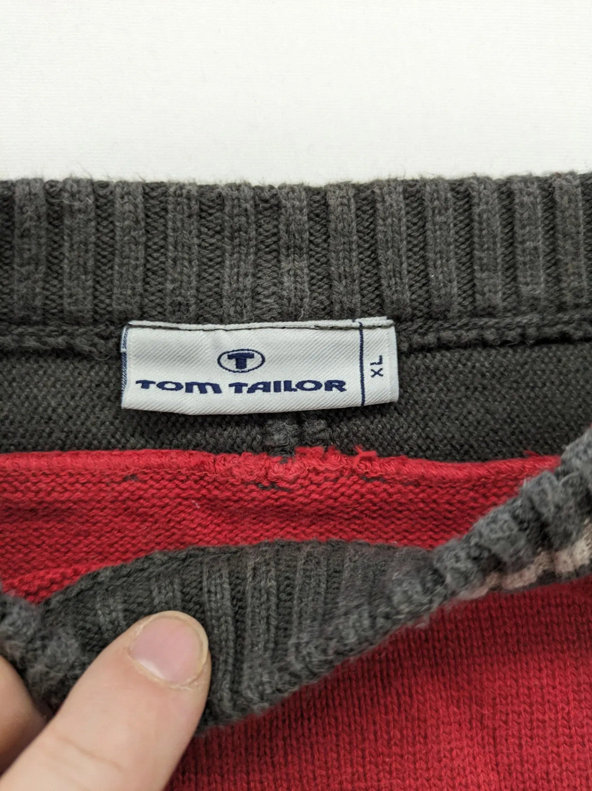 Tom Tailor black and red turtle neck jumper with "Holiday Camp" chenille patch and striped cuffs.