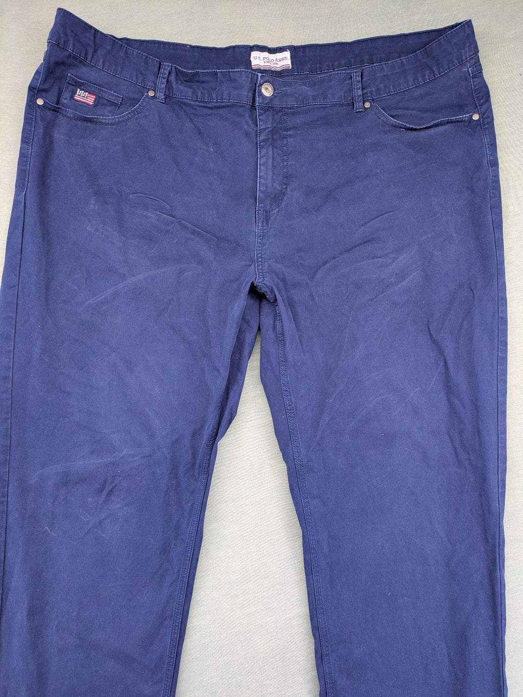 U.S. Polo Assn. navy chino pants classic 5-pocket design with subtle logo stitching