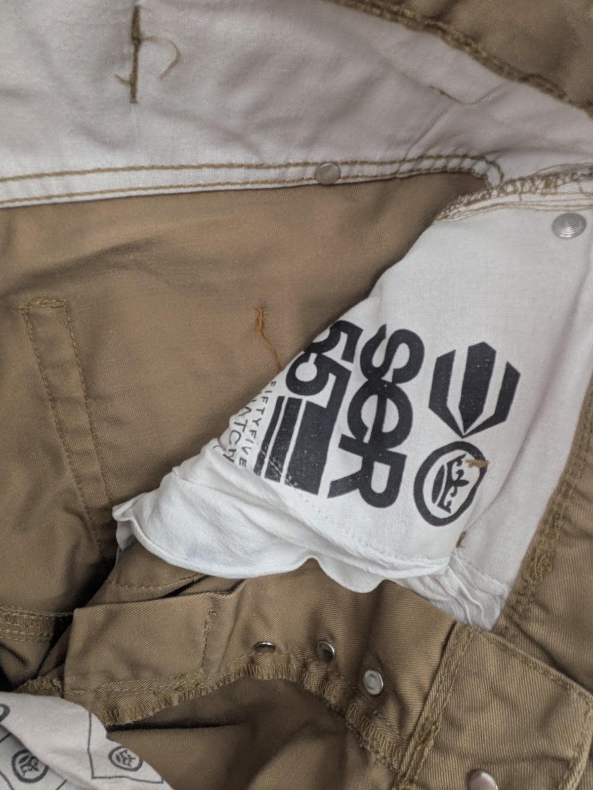 Crosshatch grey cargo pants with multiple pockets and durable cotton-polyester blend.