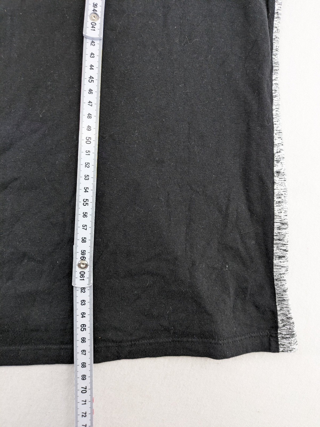 Angelo Litrico black and grey colorblock t-shirt with logo accents and soft cotton blend.