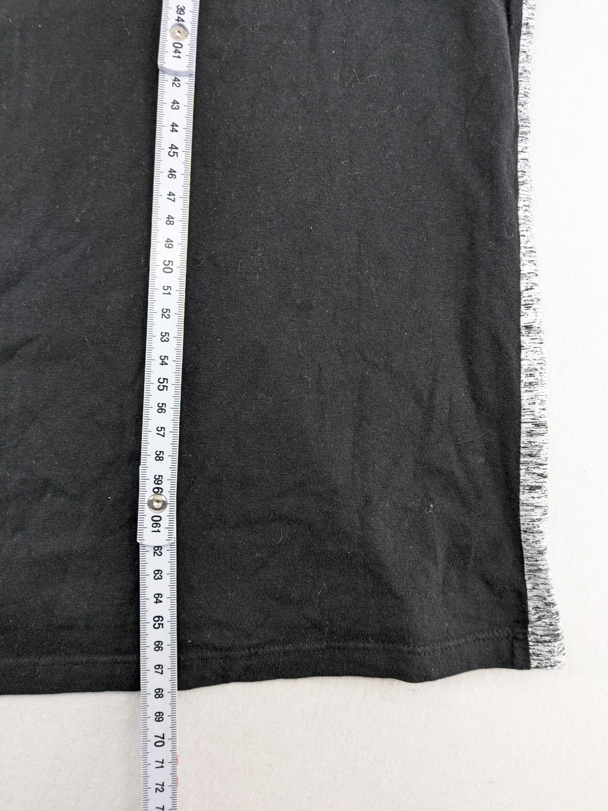 Angelo Litrico black and grey colorblock t-shirt with logo accents and soft cotton blend.