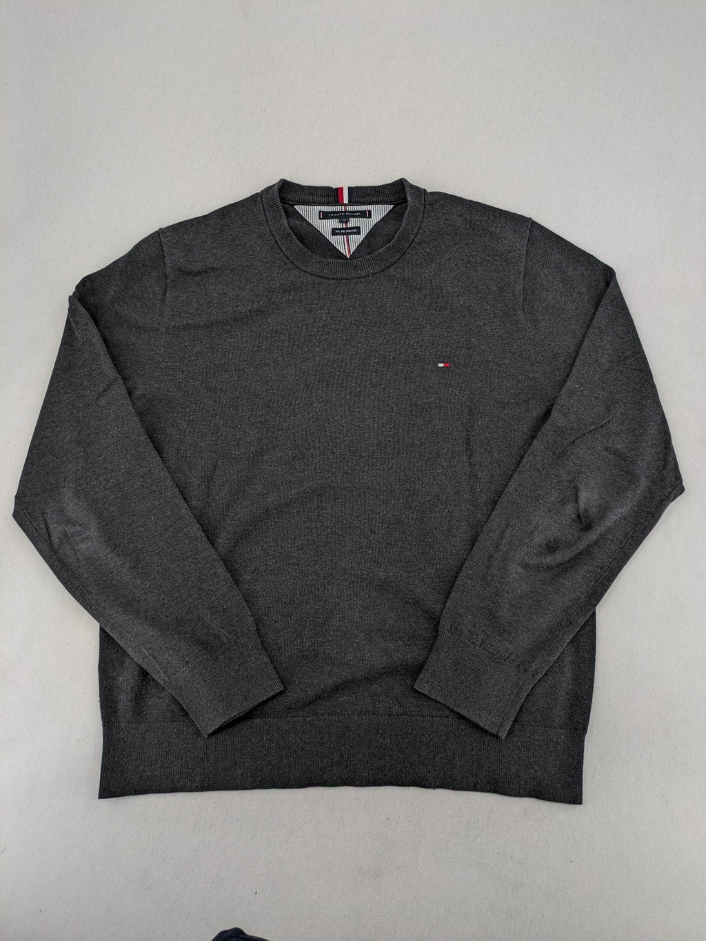 Tommy Hilfiger grey turtle neck jumper with embroidered flag logo on chest.