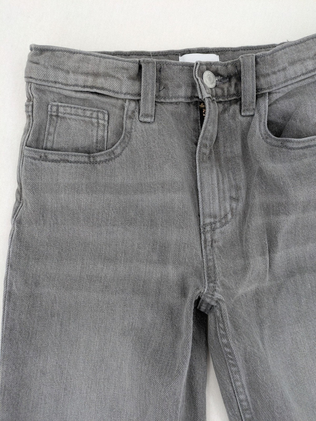 Old Navy navy straight jeans with adjustable waistband and classic 5-pocket design.
