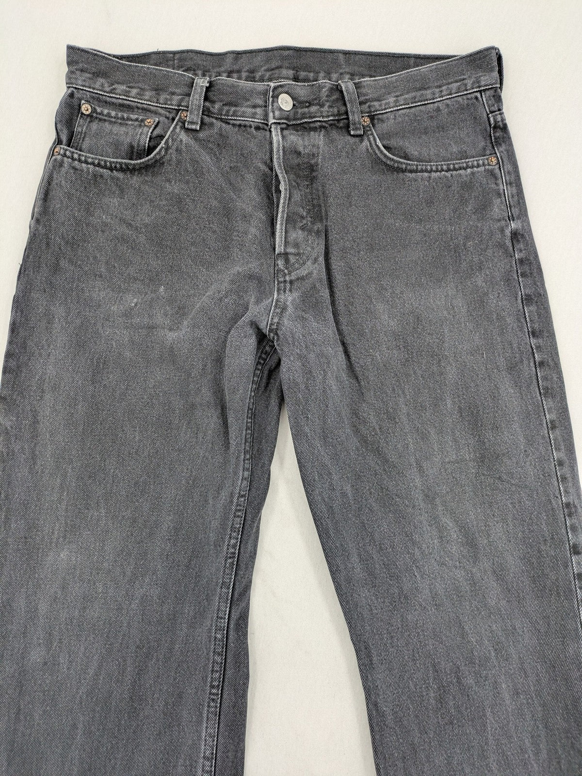 Weekday grey straight jeans washed denim with button fly and classic fit.