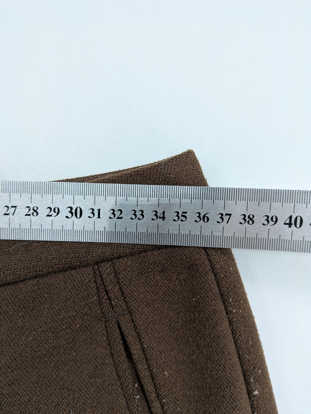 Liuliu pink high waist pants with pleats, side pockets, and classic design.
