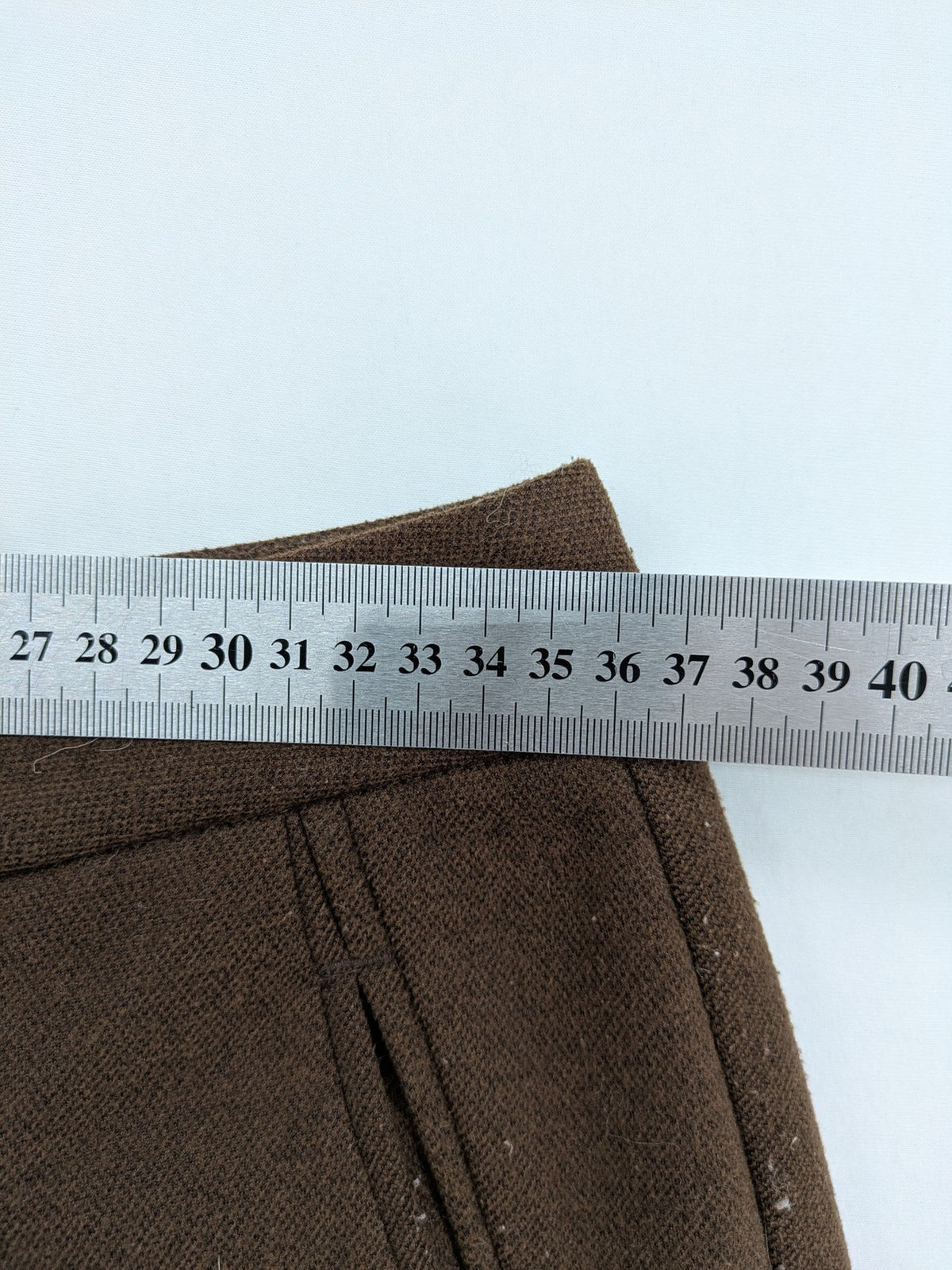Liuliu pink high waist pants with pleats, side pockets, and classic design.