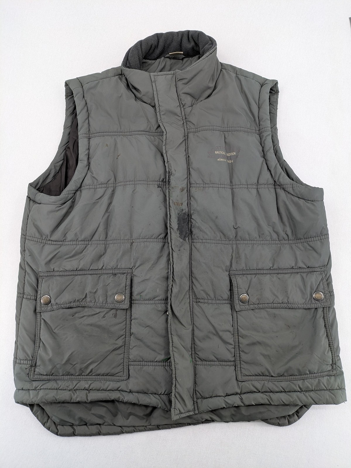 Camargue grey quilted jacket with fleece collar and buttoned pockets.