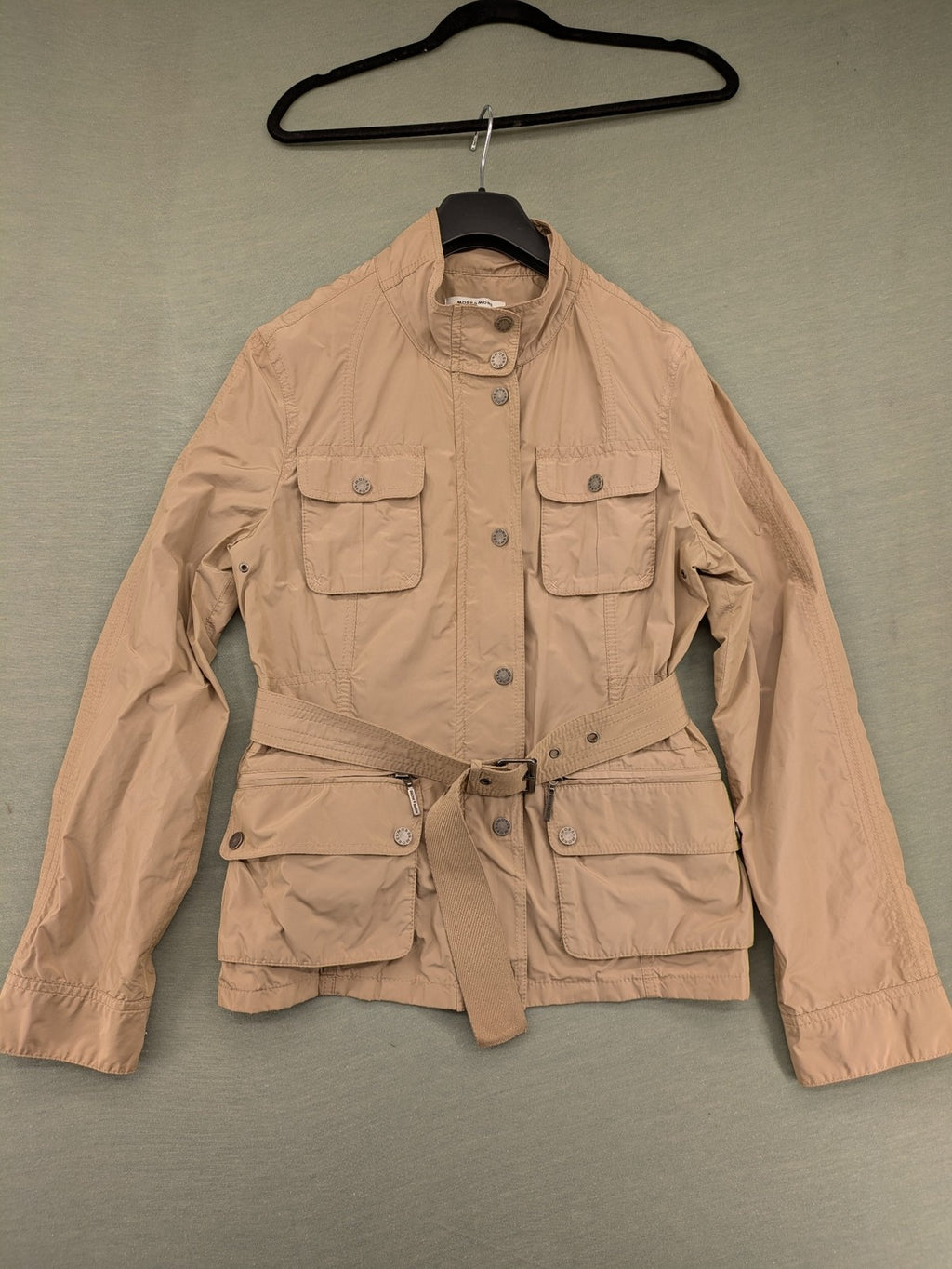 MORE & MORE beige field jacket with belt, four pockets, and standing collar.