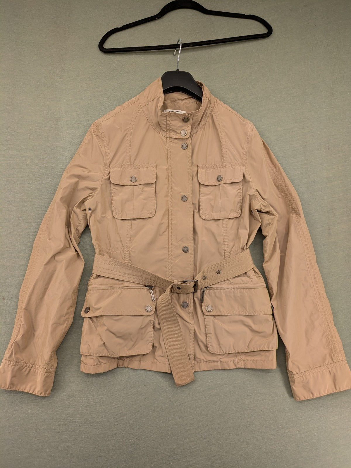 MORE & MORE beige field jacket with belt, four pockets, and standing collar.