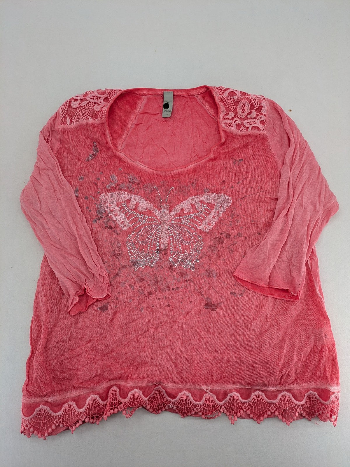 TREDY pink top with butterfly graphic, embellished with rhinestones and lace accents.