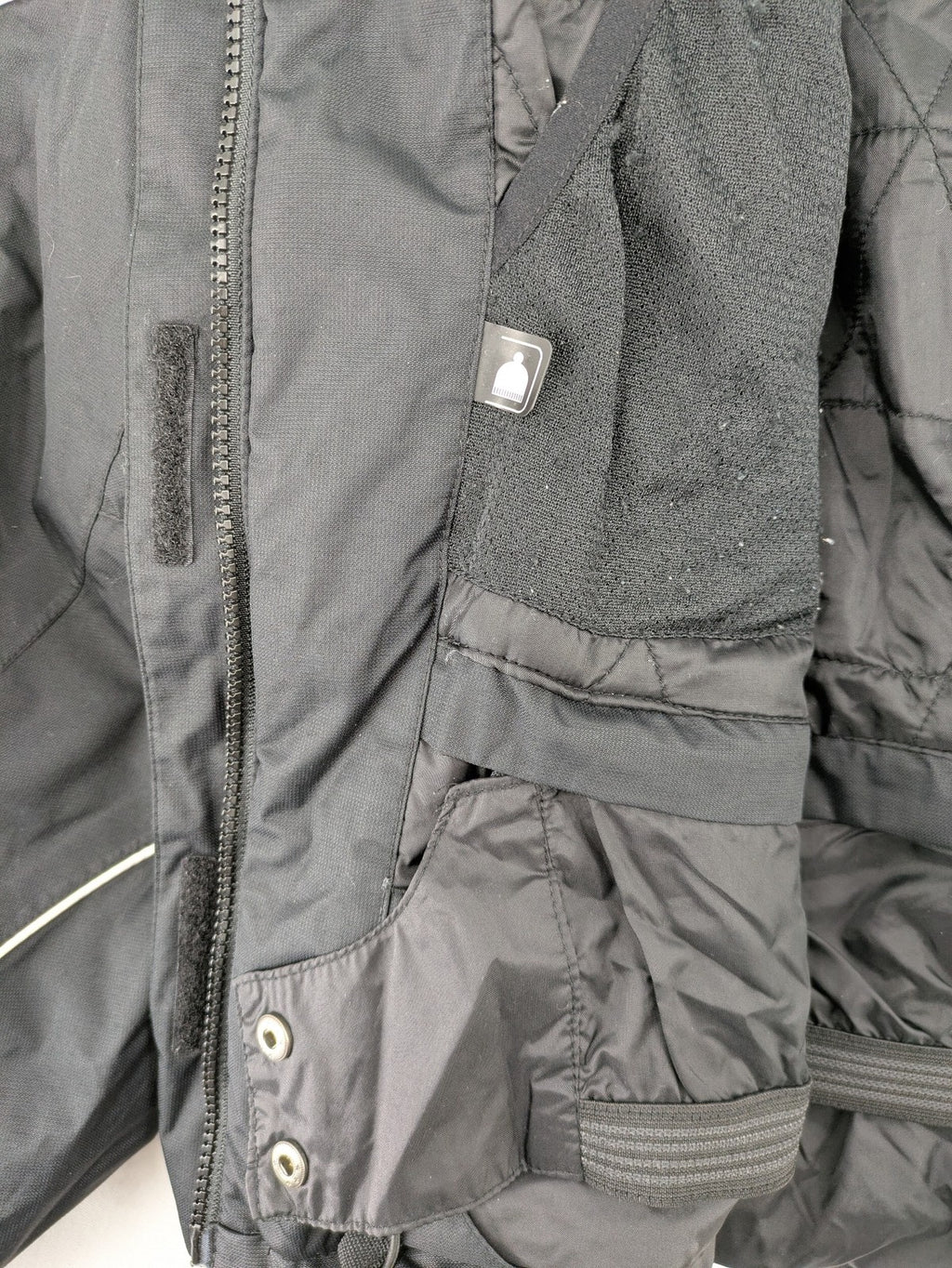 Icepeak black and white ski snowboard jacket with RECCO logo and quilted insulation.